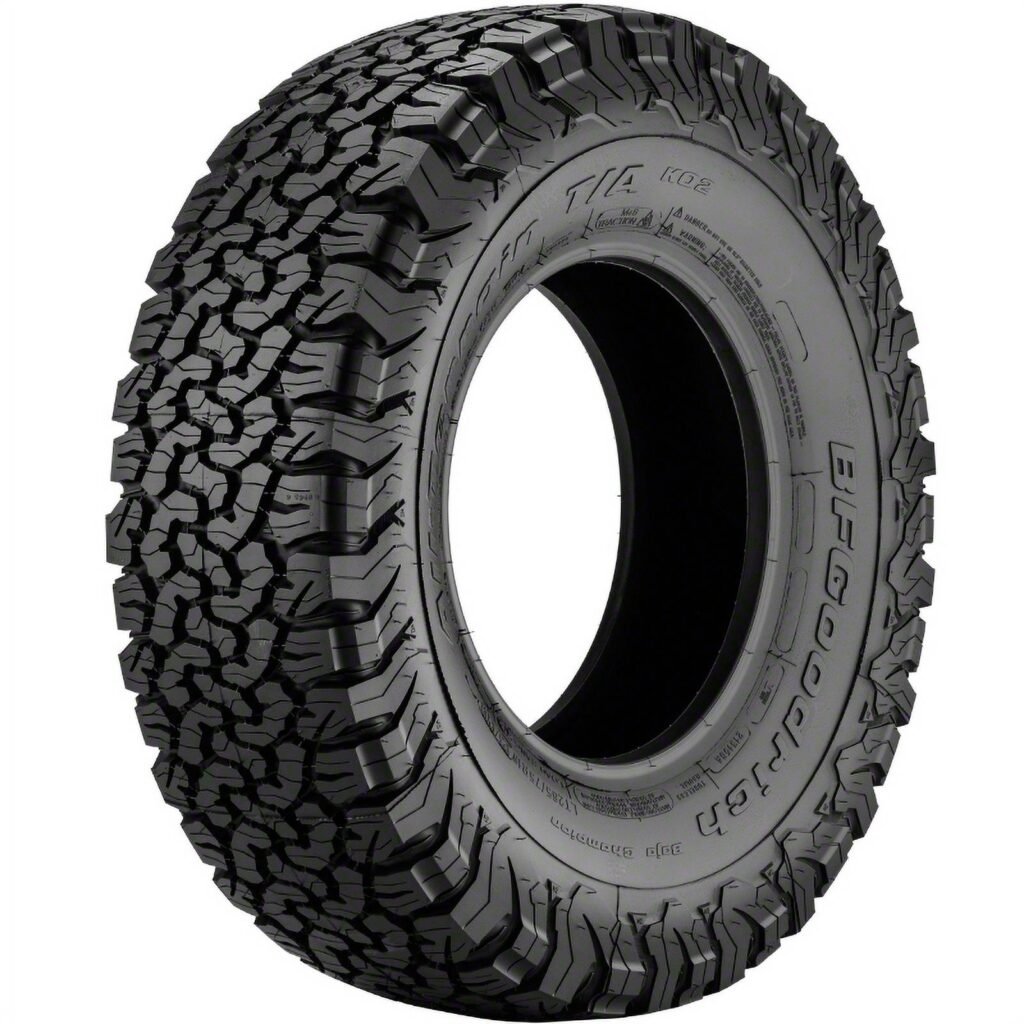 BFGoodrich All-Terrain T/A KO2 tire. A rugged all-terrain tire known for its strong sidewall protection, excellent off-road traction in mud and snow, and durable construction suitable for overlanding