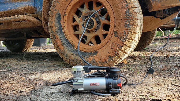 "Viair 88P Portable Air Compressor: Compact, rugged air compressor with a durable design, featuring a 16-foot power cord and a 4-foot air hose, ideal for off-road tire inflation and other applications."